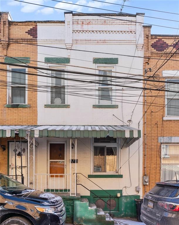 9 Edith Place Pittsburgh, PA 15213 - Photo 2 of 25 a view of a building with a car park side of road