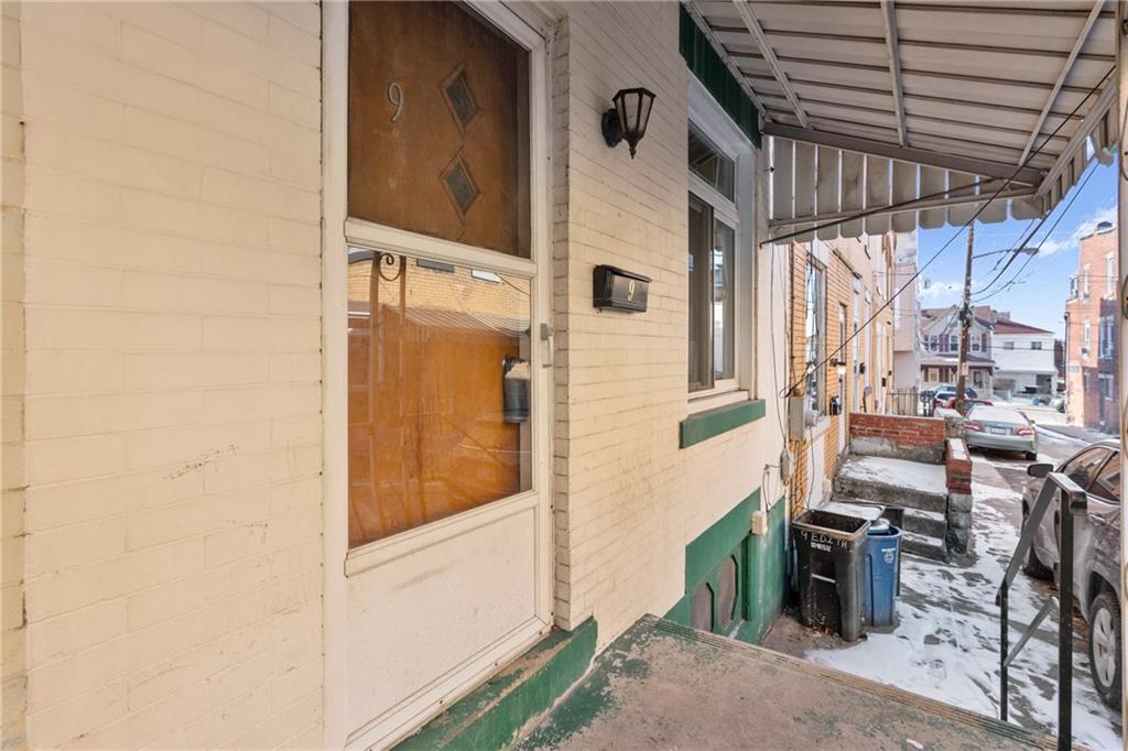 9 Edith Place Pittsburgh, PA 15213 - Photo 3 of 25 a bathroom with a sink and a mirror