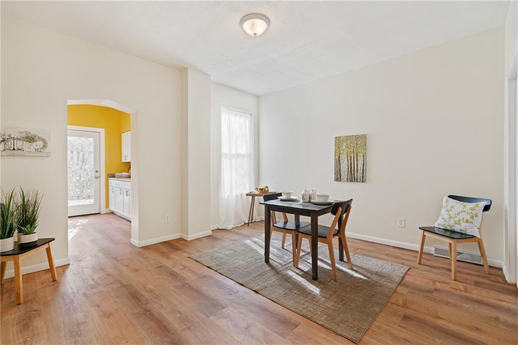 9 Edith Place Pittsburgh, PA 15213 - Photo 6 of 25 a view of a livingroom with furniture and wooden floor