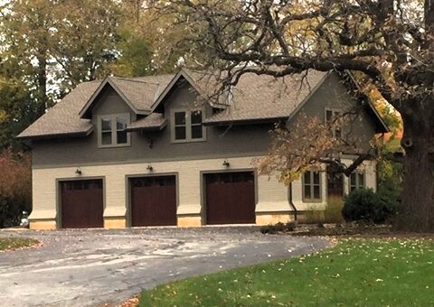 1516 South Batavia Avenue Geneva, IL 60134 - Photo 11 of 11 a front view of a house with a yard and garage