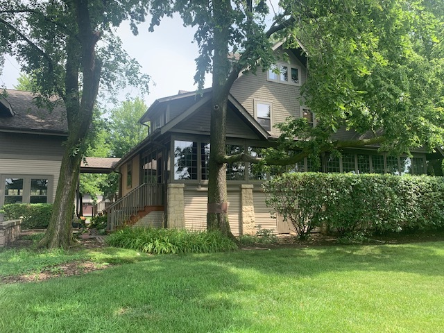 1516 South Batavia Avenue Geneva, IL 60134 - Photo 2 of 11 a front view of house with yard and green space
