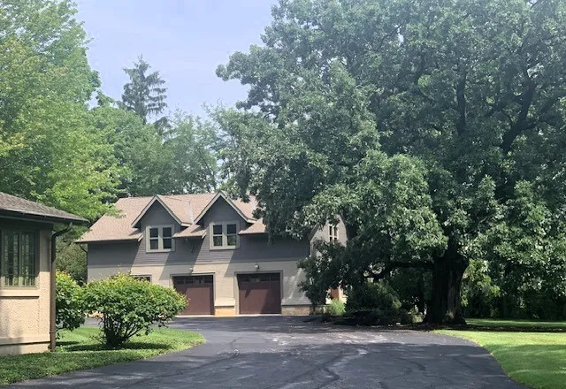 front view of a house with a street