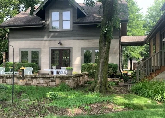 a house view with sitting space and garden space