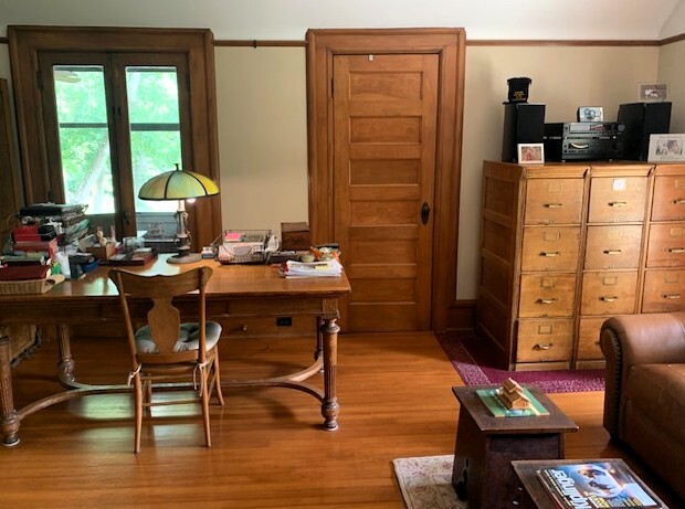 1516 South Batavia Avenue Geneva, IL 60134 - Photo 8 of 11 a room with furniture and window