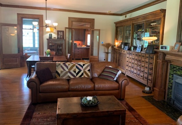 1516 South Batavia Avenue Geneva, IL 60134 - Photo 9 of 11 a living room with furniture and a chandelier