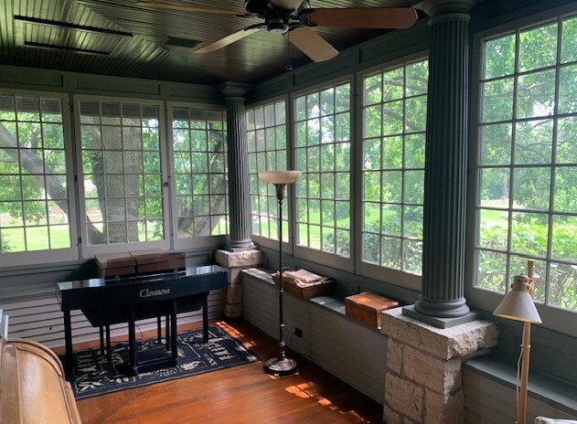 1516 South Batavia Avenue Geneva, IL 60134 - Photo 10 of 11 a living room with furniture and a floor to ceiling window