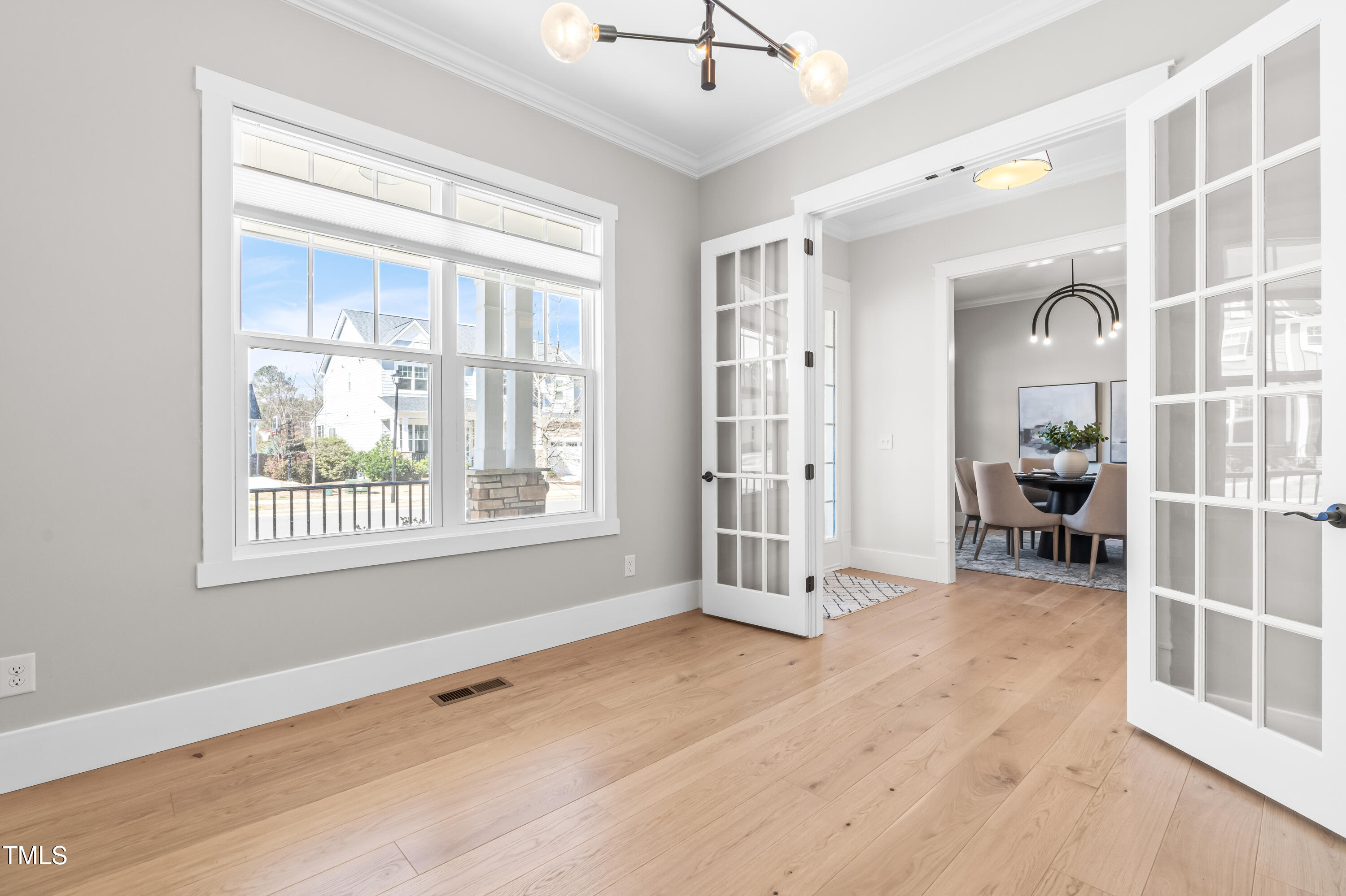 409 Tintern Lane Apex, NC 27523 - Photo 18 of 62 a view of livingroom with furniture and windows