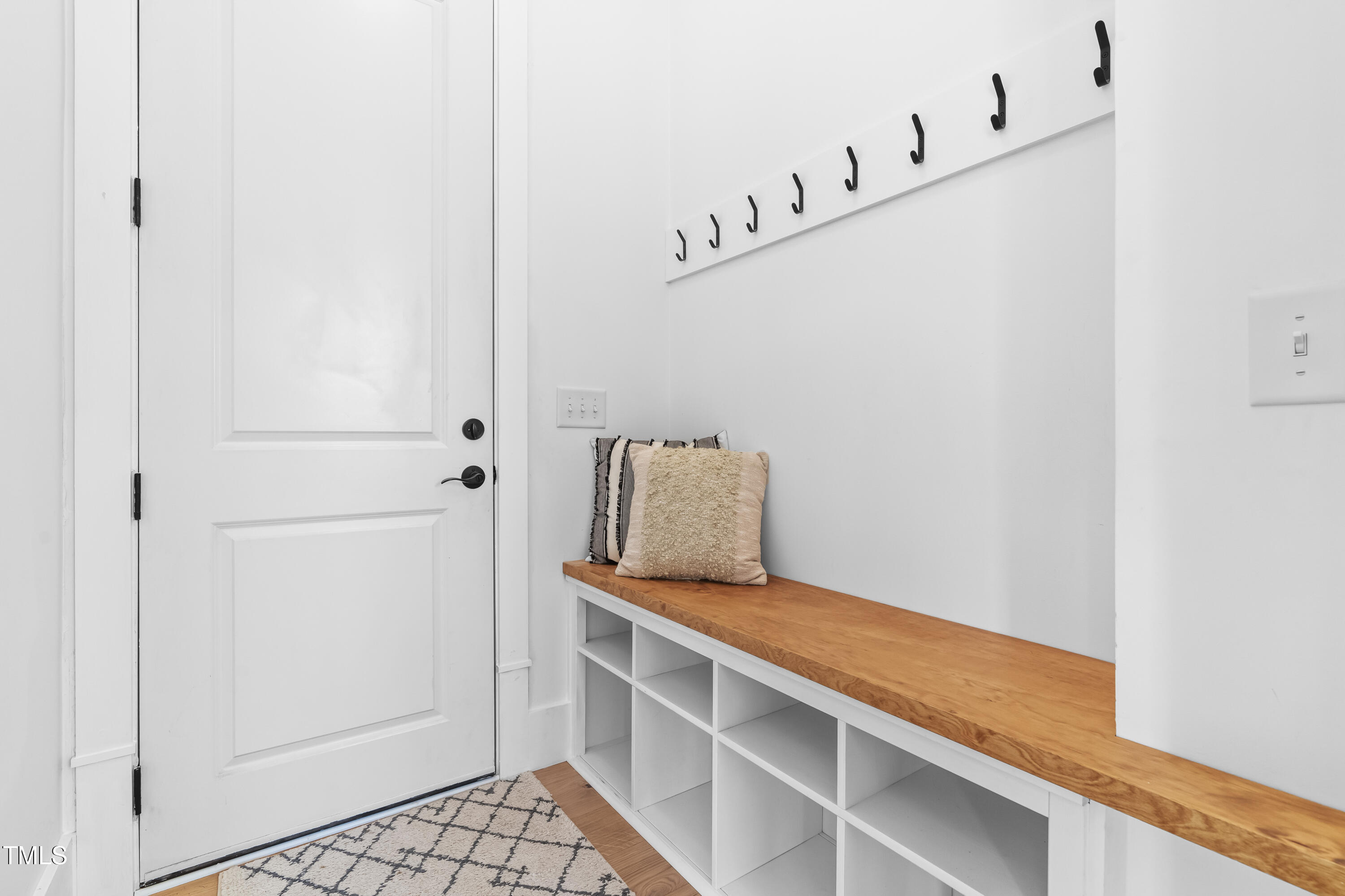 409 Tintern Lane Apex, NC 27523 - Photo 22 of 62 a view of staircase with white walls