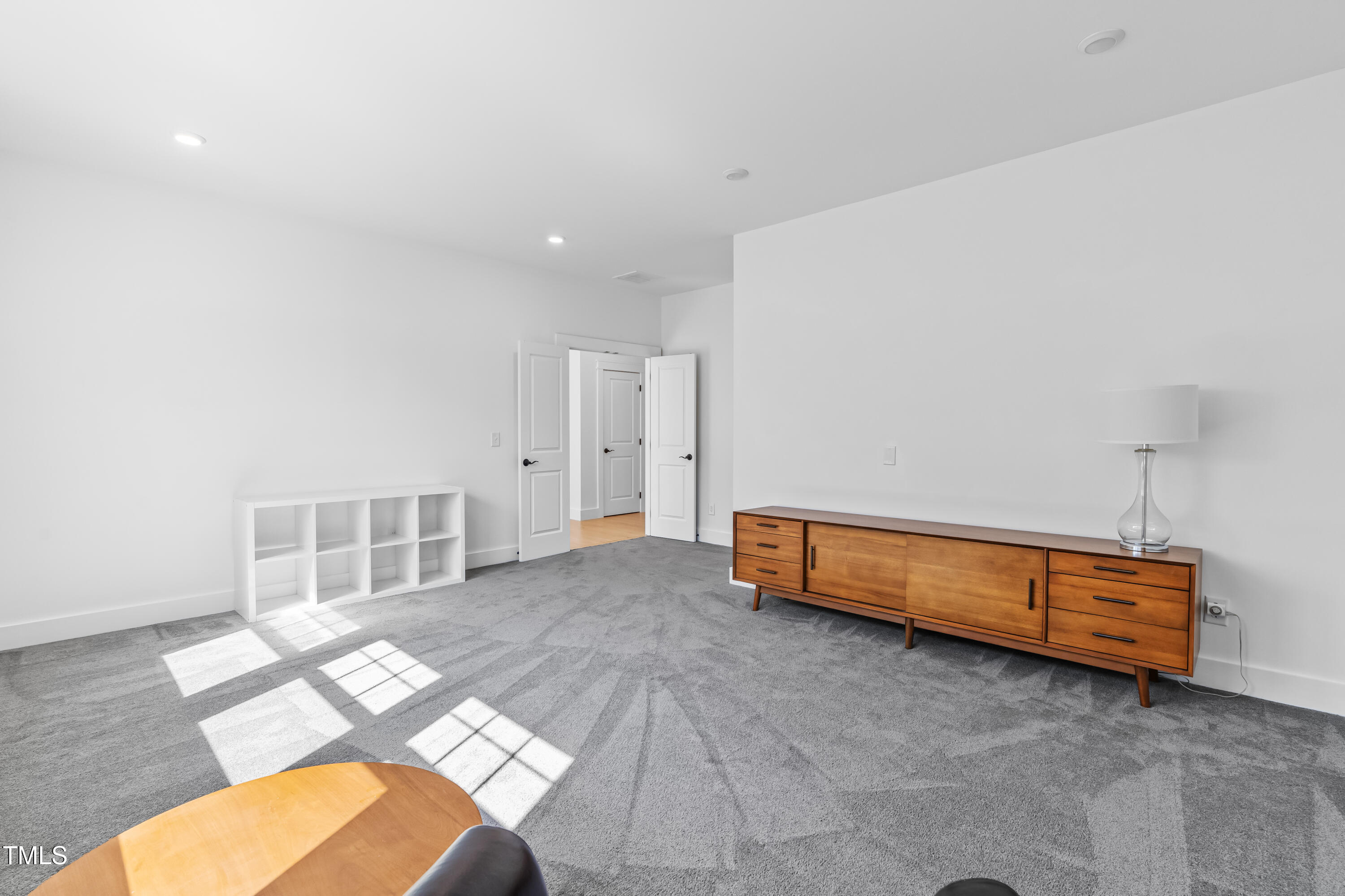 409 Tintern Lane Apex, NC 27523 - Photo 35 of 62 a spacious bedroom with a bed and a window