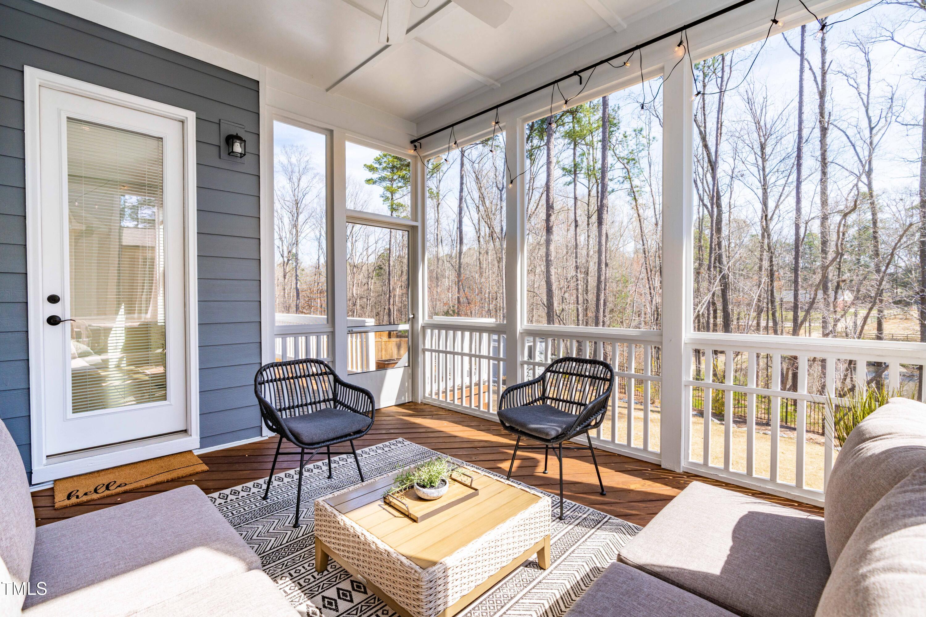 409 Tintern Lane Apex, NC 27523 - Photo 49 of 62 a living room with furniture and a window