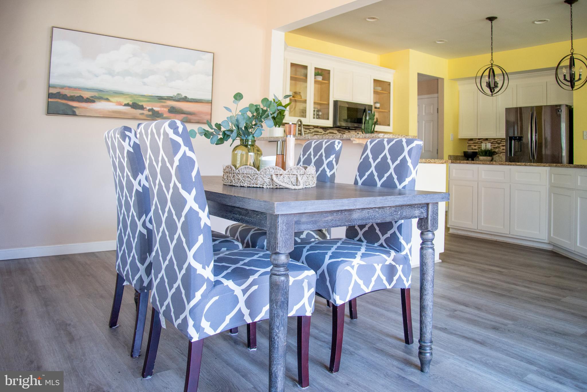15212 Fairen Lane Colonial Heights, VA 23834 - Photo 14 of 31 a view of a dining room with furniture and wooden floor