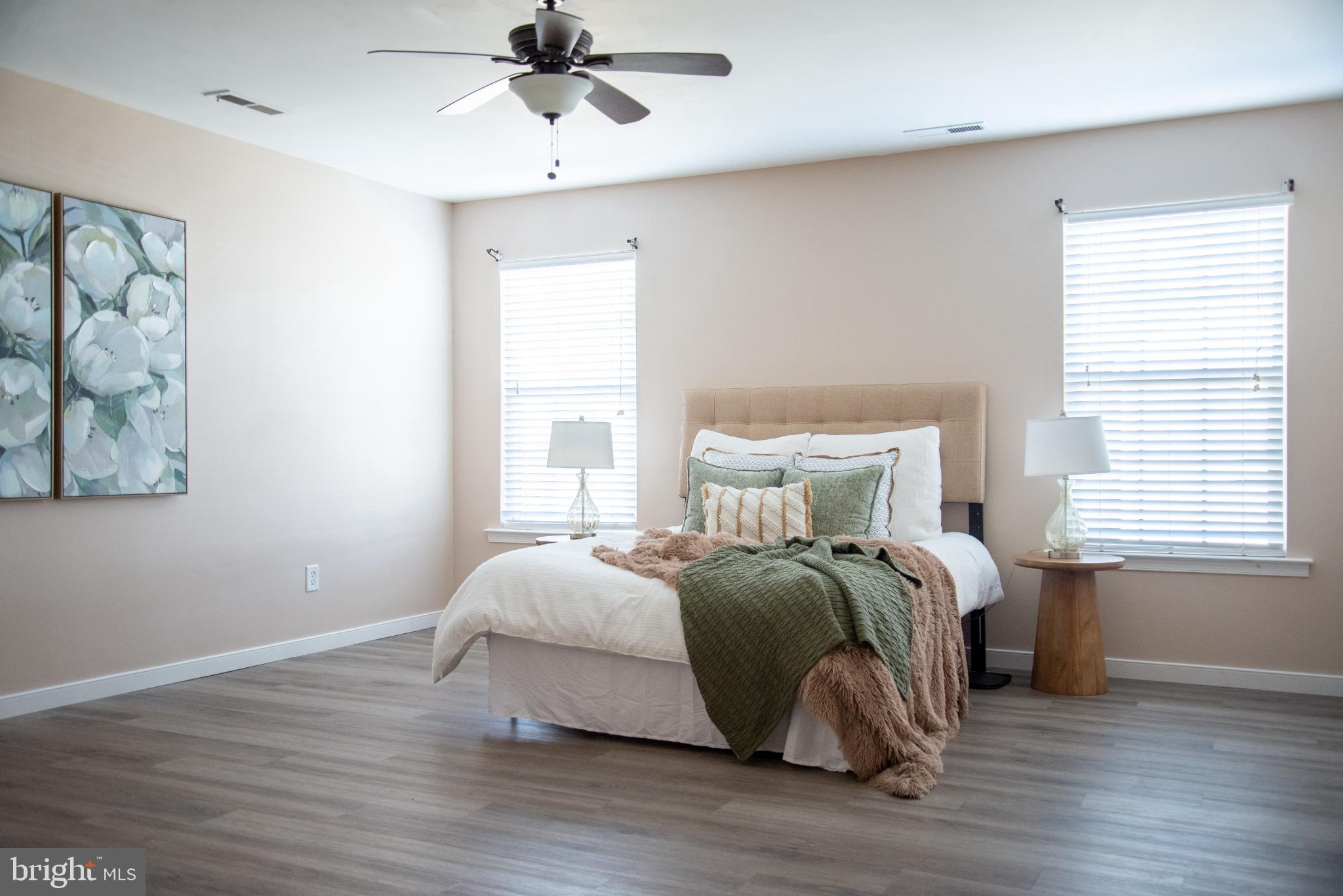 15212 Fairen Lane Colonial Heights, VA 23834 - Photo 25 of 31 a bedroom with a bed and wooden floor