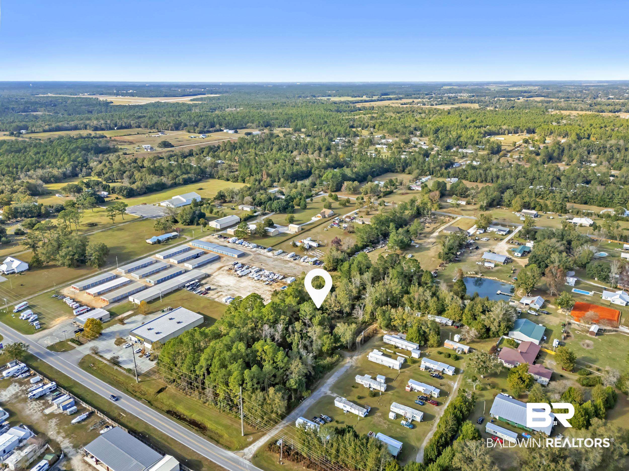 9967 County Road 83 Elberta, AL 36530 - Photo 9 of 21 Aerial view of property and surrounding area
