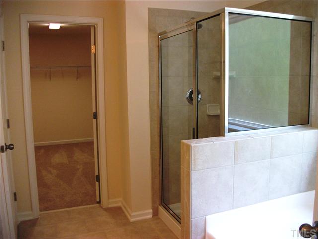 3608 Greenville Loop Road Wake Forest, NC 27587 - Photo 8 of 21 Master Bath also features Tile Floors, Tiled Shower and Tile Tub surround!!! Get ready to Relax!!!
