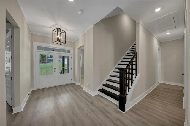 a view of entryway with wooden floor