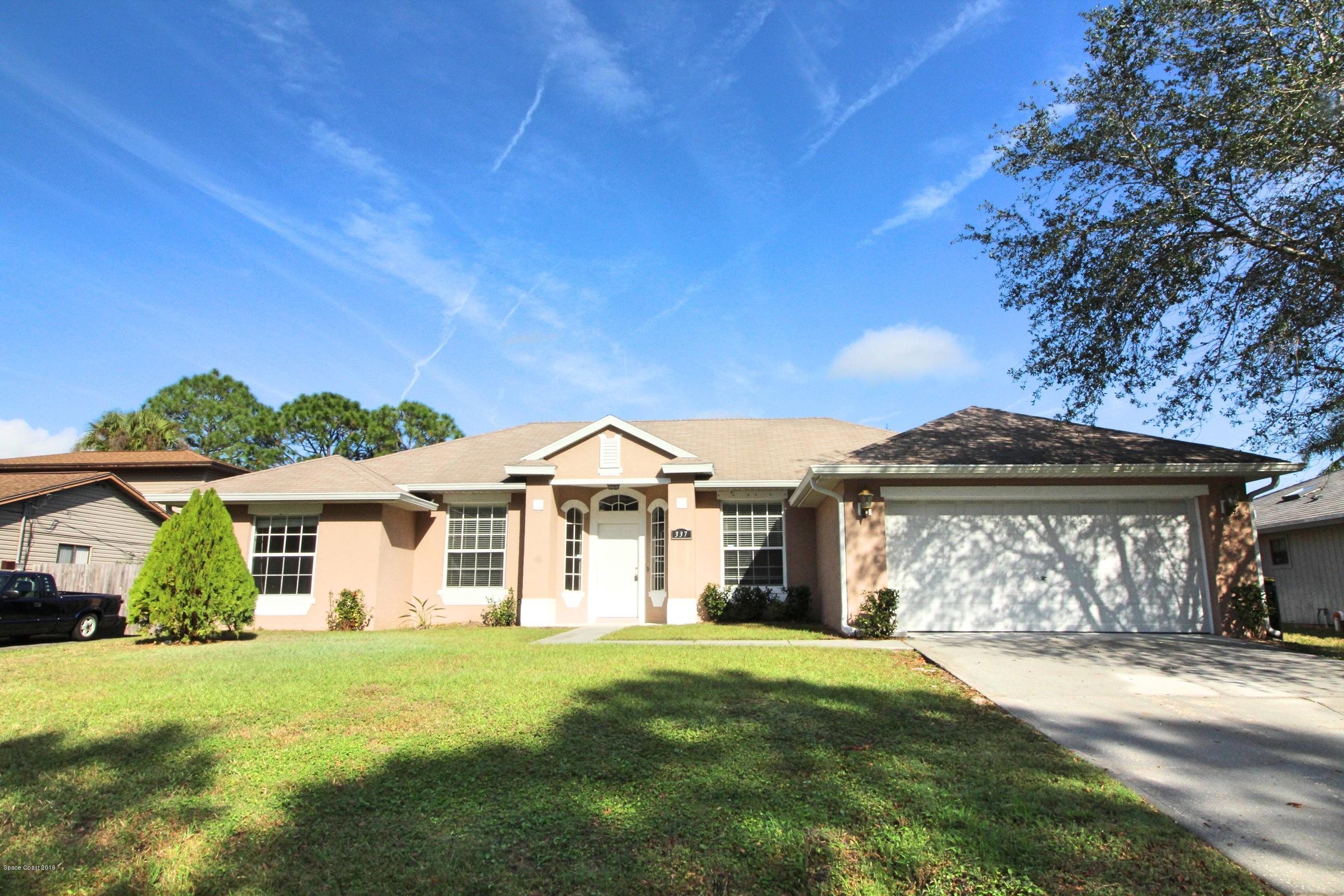 337 Rheine Road Northwest Palm Bay, FL 32907 - Photo 1 of 15 Front Exterior