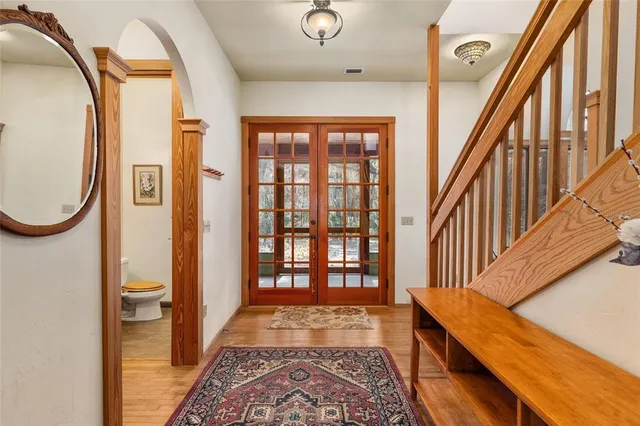 a kitchen with stainless steel appliances granite countertop a stove and a refrigerator