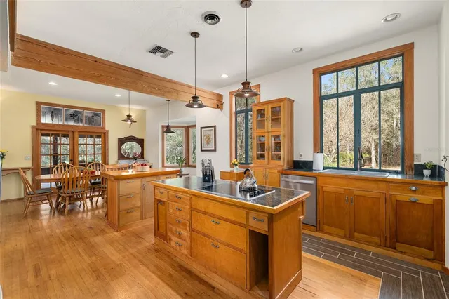 a view of a livingroom with furniture and a flat screen tv
