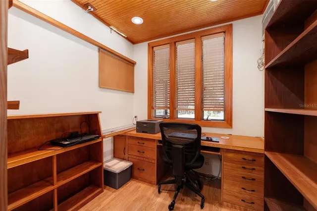 a view of a swimming pool with an outdoor space and seating area