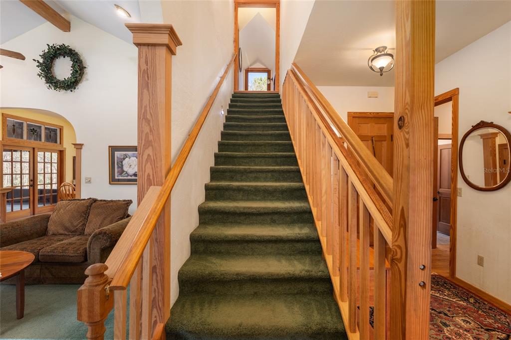 21736 Northwest 75th Avenue Road Micanopy, FL 32667 - Photo 51 of 88 a view of entryway and hall with wooden floor