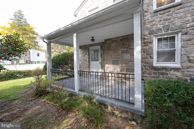 a view of yard with swimming pool and trees