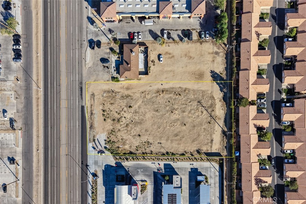 15403 Bear Valley Road Hesperia, CA 92345 - Photo 8 of 21 a view of a hallway with a building