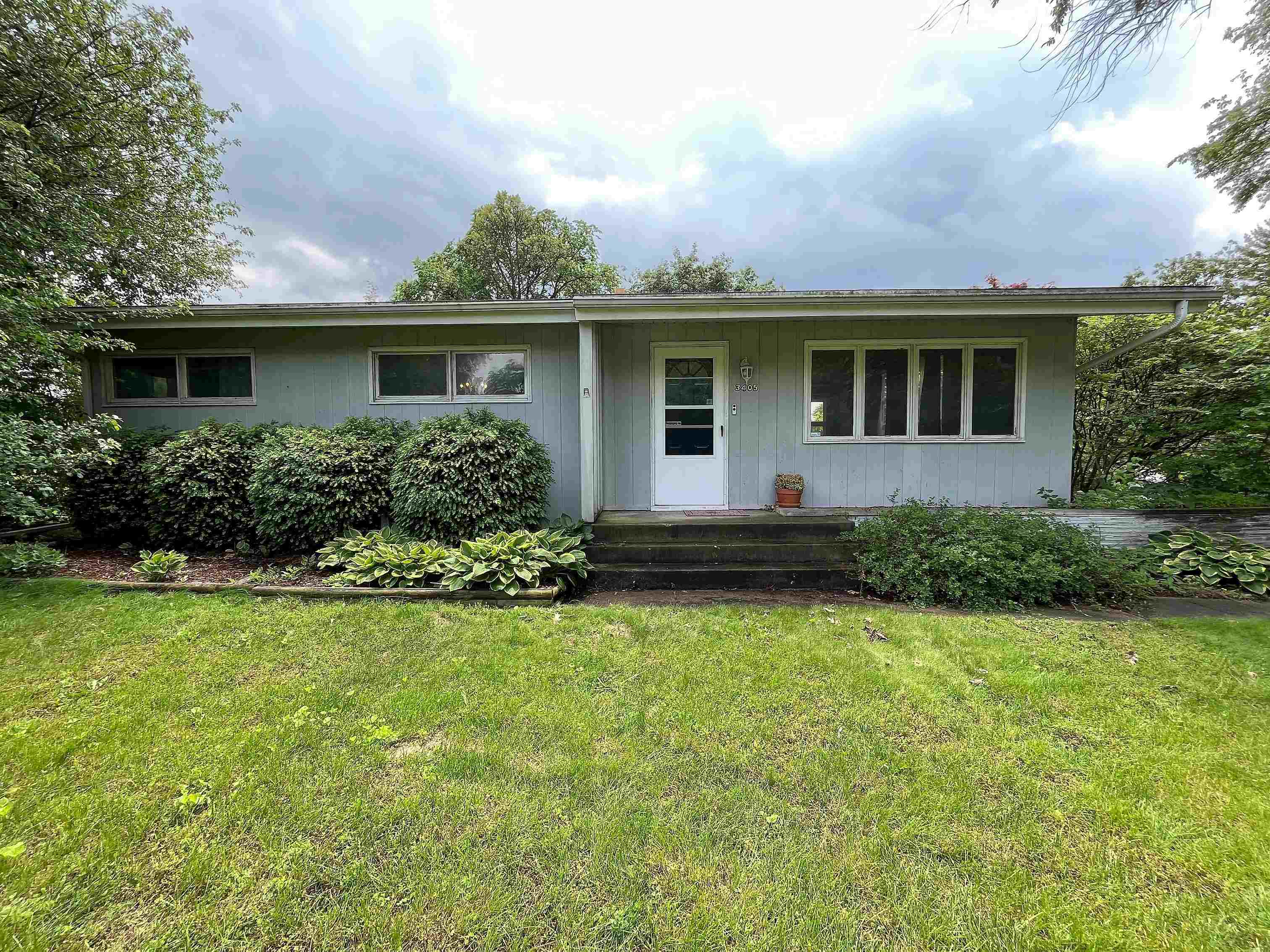 3405 North View Road Rockford, IL 61107 - Photo 1 of 33 a front view of house with yard and green space