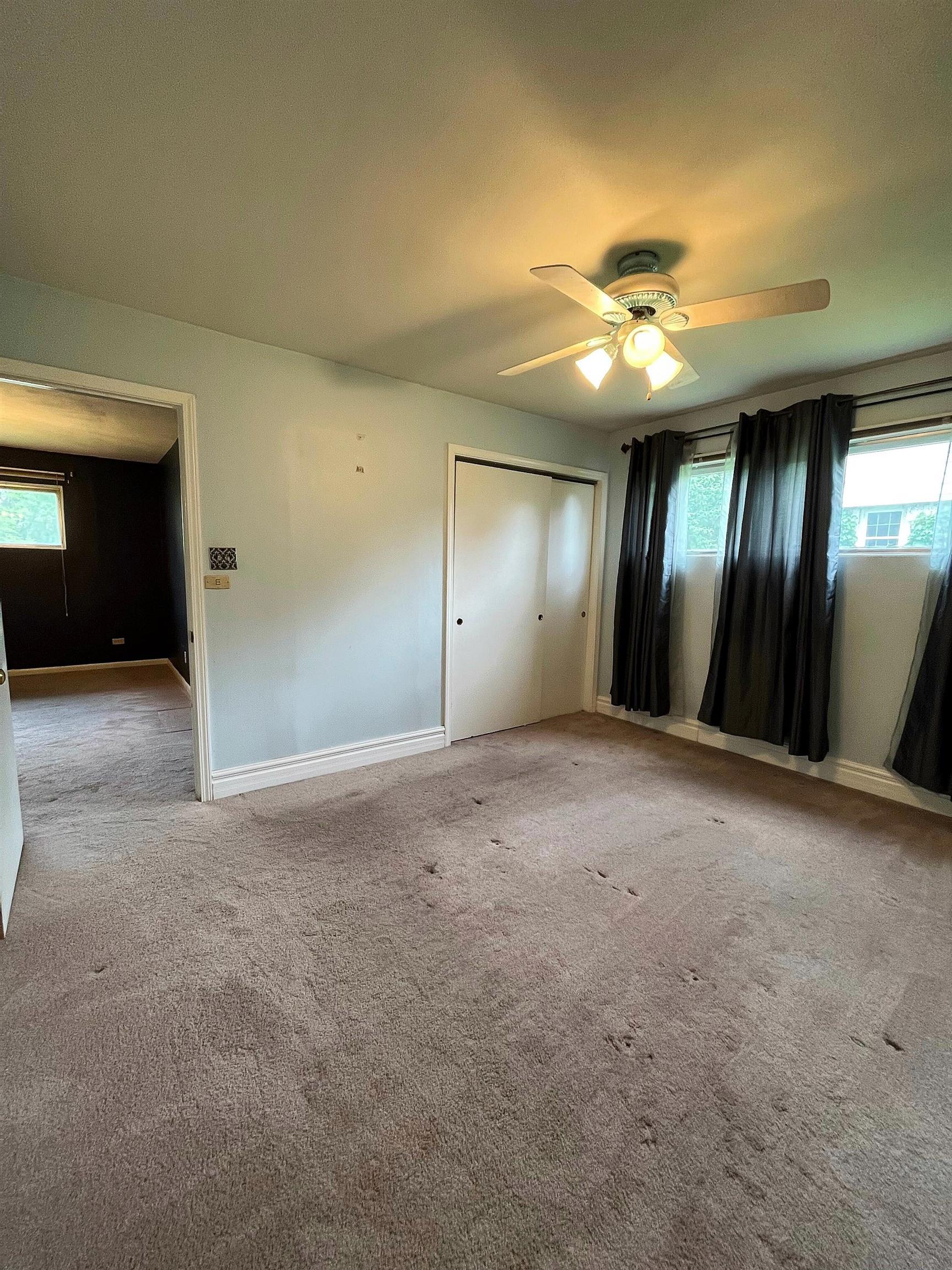 3405 North View Road Rockford, IL 61107 - Photo 14 of 33 a view of an empty room and chandelier fan