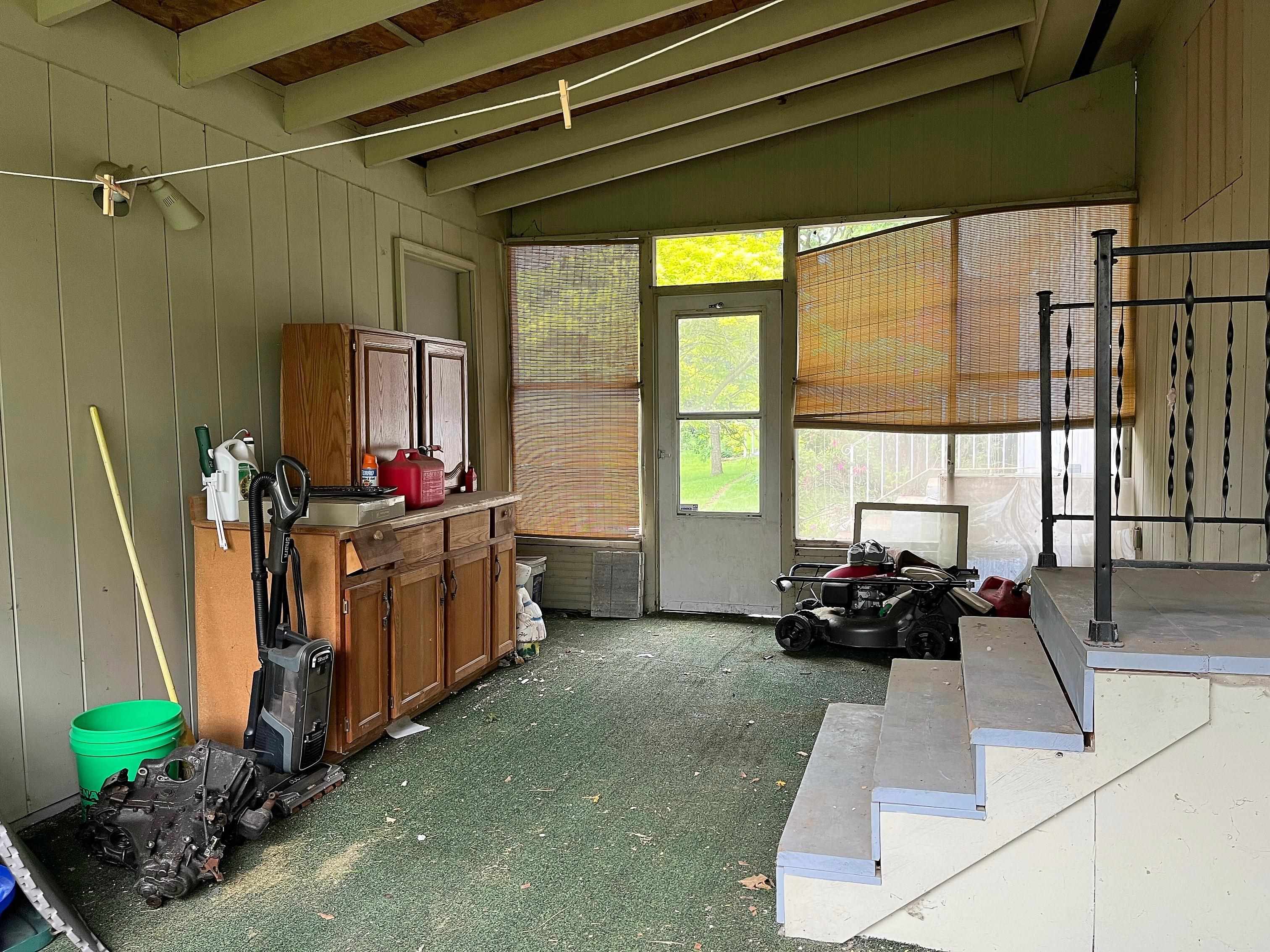 3405 North View Road Rockford, IL 61107 - Photo 27 of 33 a living room with furniture and a large window