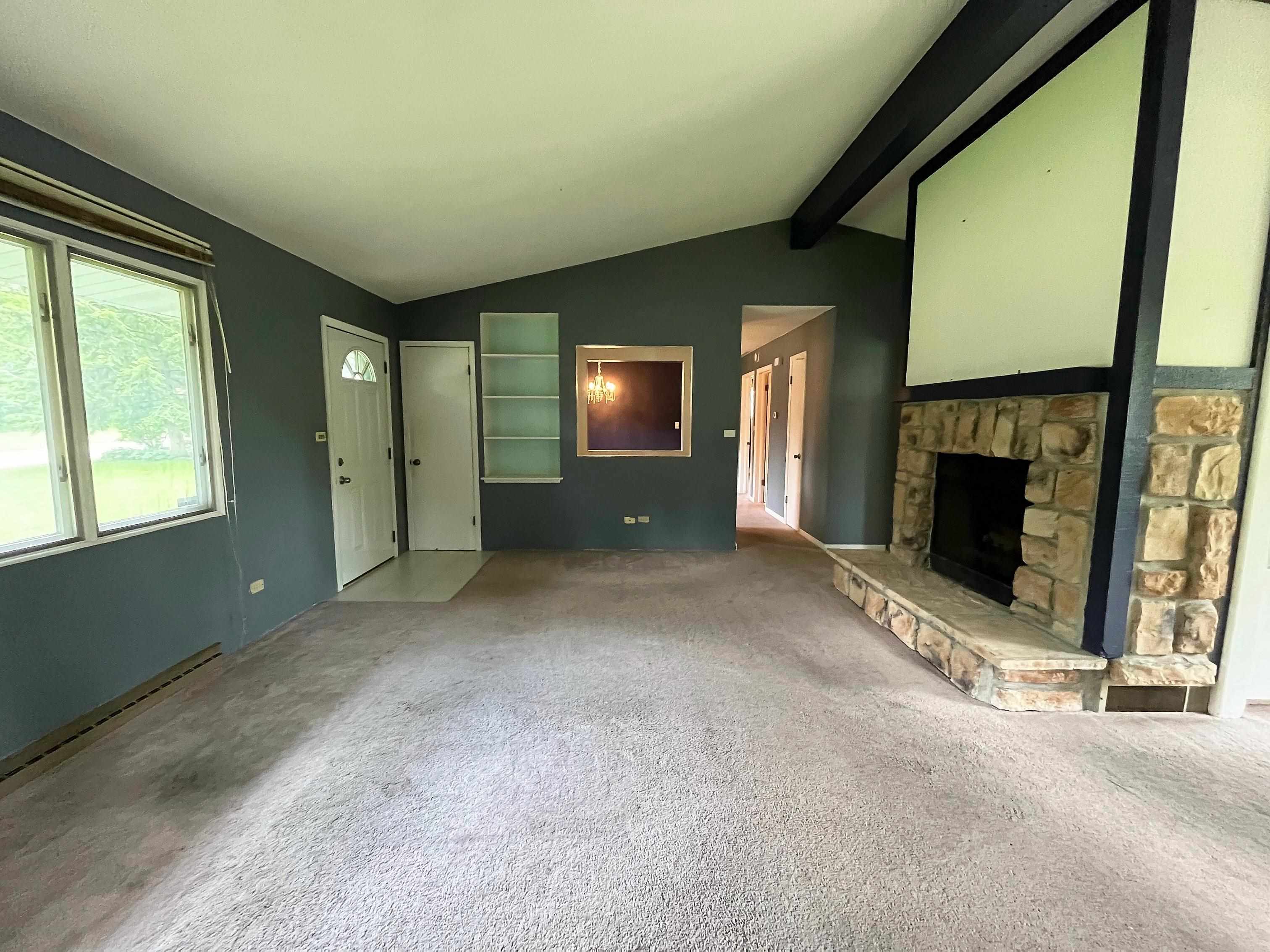 3405 North View Road Rockford, IL 61107 - Photo 4 of 33 a view of a livingroom with a fireplace