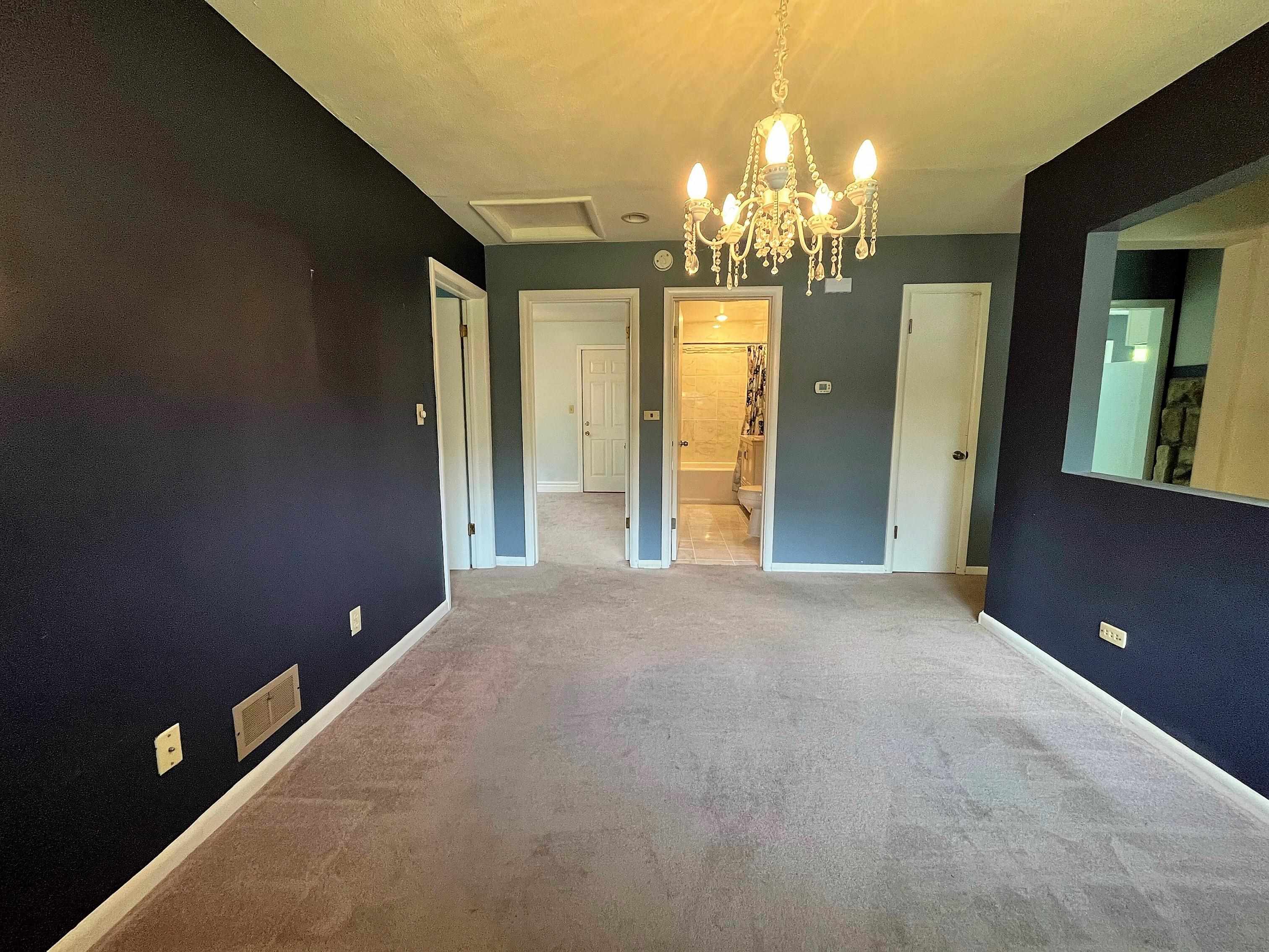 3405 North View Road Rockford, IL 61107 - Photo 6 of 33 a view of a chandelier in big room and chandelier