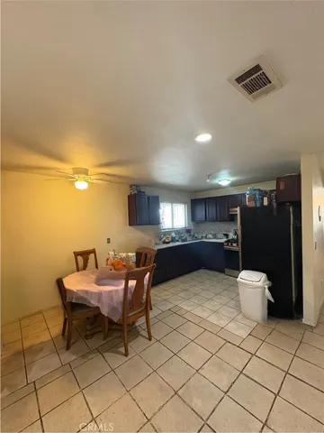 a kitchen with a stove and a cabinets
