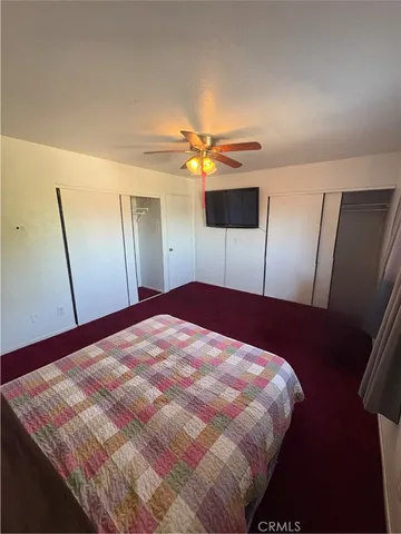 a room with furniture and chandelier