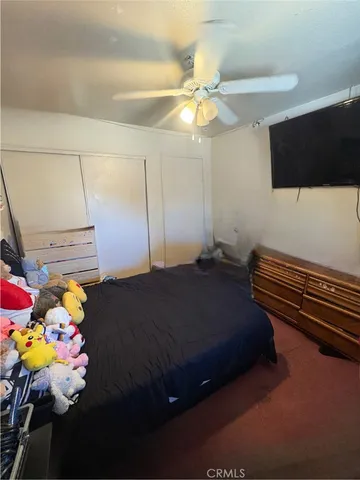 a room with furniture and air hockey table