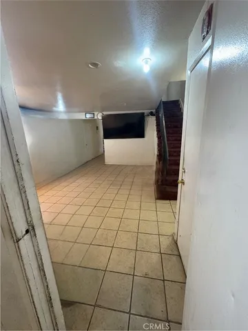 a bedroom with a bed and a shower