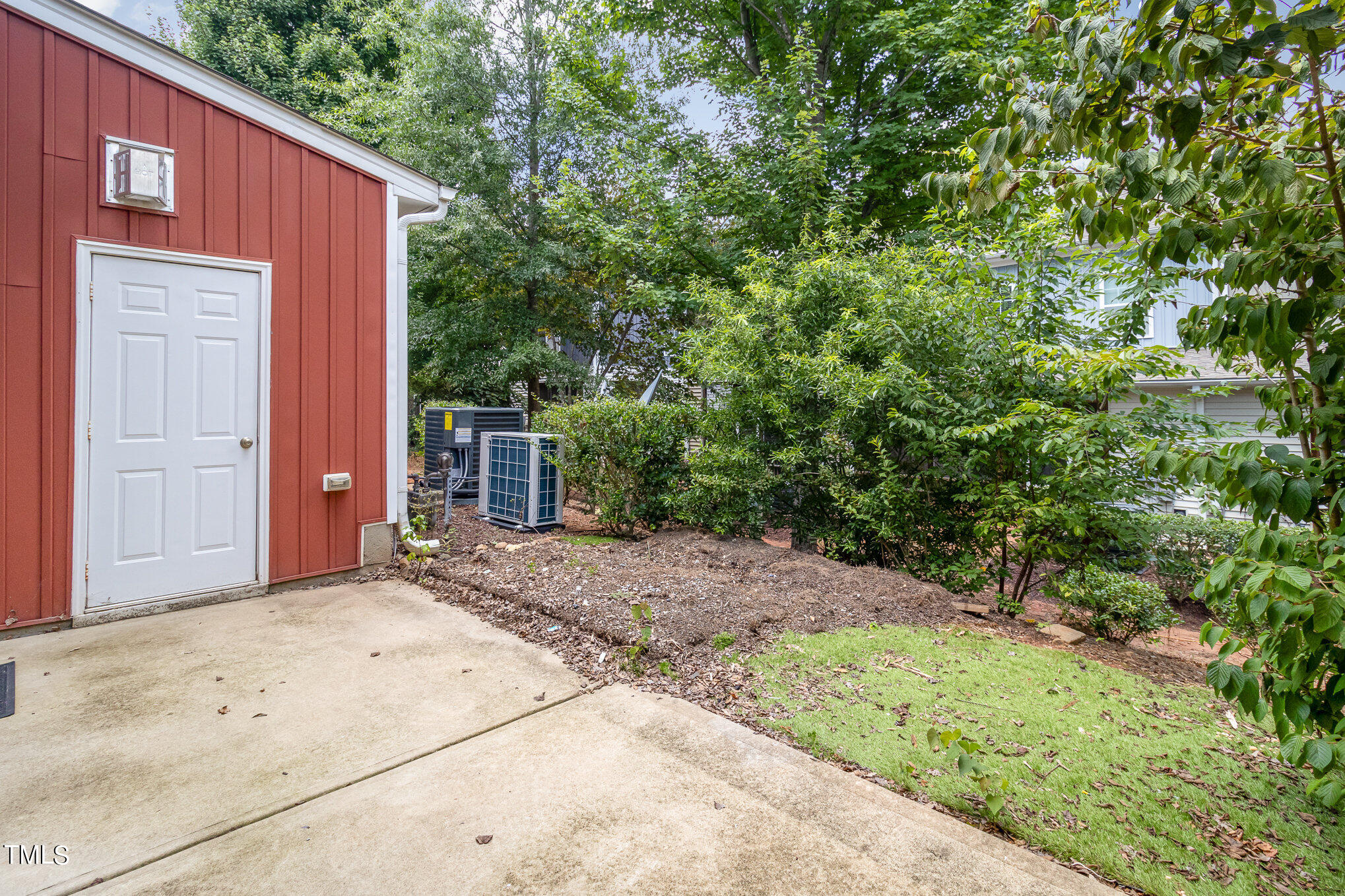 2418 Memory Ridge Drive Raleigh, NC 27606 - Photo 25 of 27 a view of a house with a backyard