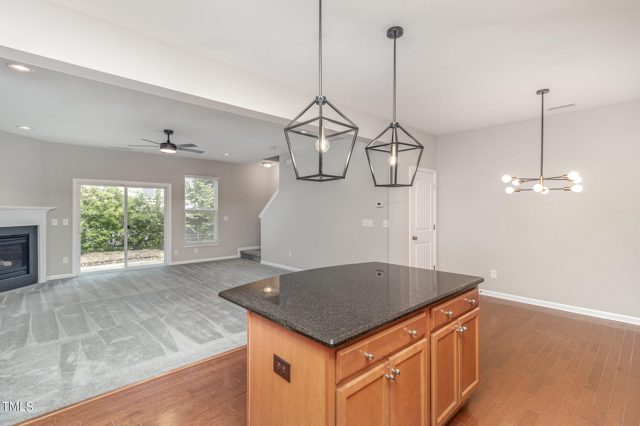 2418 Memory Ridge Drive Raleigh, NC 27606 - Photo 9 of 27 a kitchen with a sink a window and cabinetry