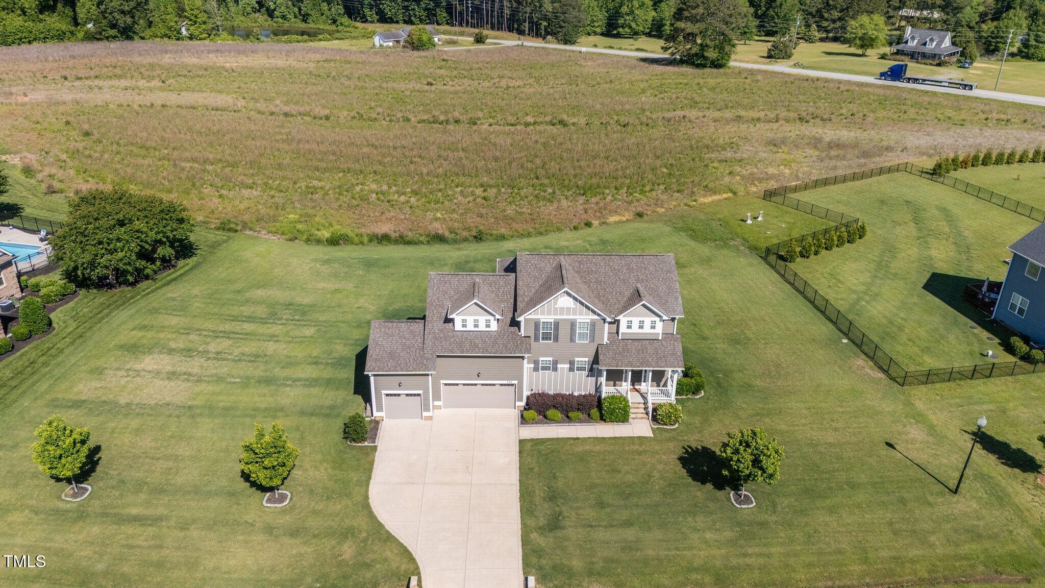 124 Brookstone Way Angier, NC 27501 - Photo 2 of 49 58-web-or-mls-DJI_20250508110456_0022_D