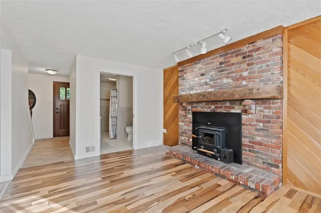 a view of a livingroom with a fireplace