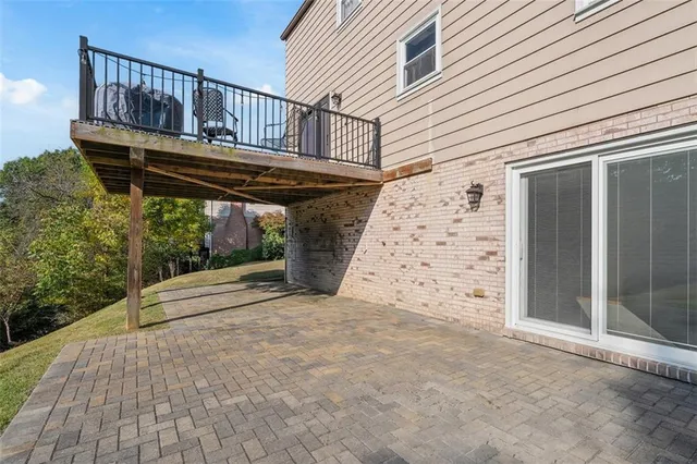 a view of entryway with wooden stairs