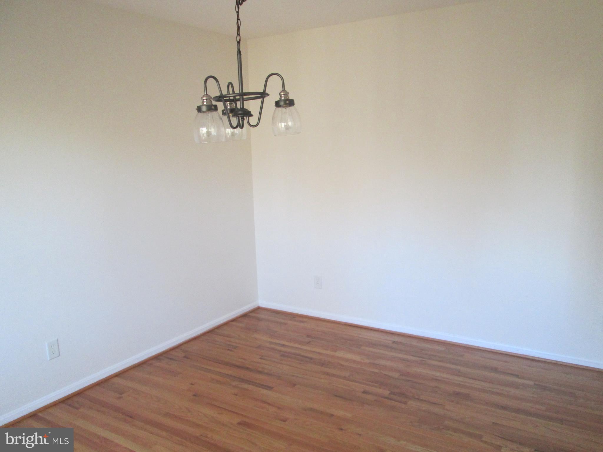 10 Waterford Road Pasadena, MD 21122 - Photo 21 of 57 Formal DR (view 2) with hardwood floor!