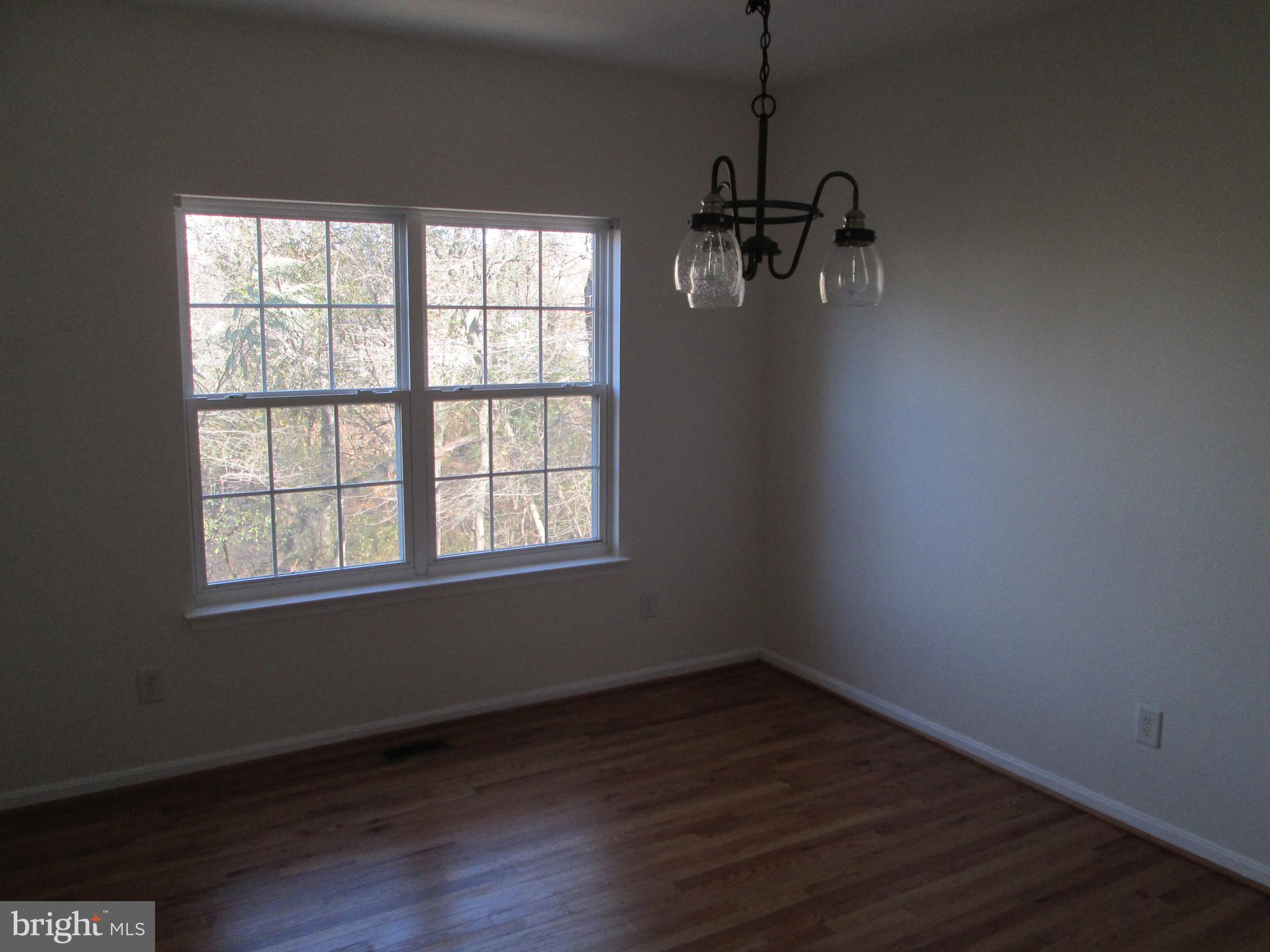 10 Waterford Road Pasadena, MD 21122 - Photo 22 of 57 Formal DR (view 1) w/hardwood floors