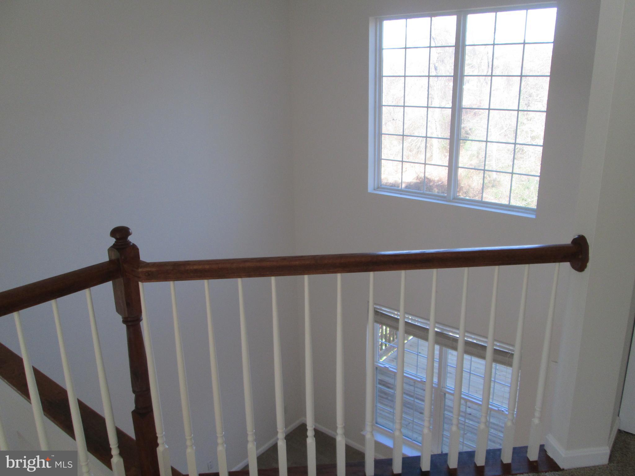 10 Waterford Road Pasadena, MD 21122 - Photo 26 of 57 View from Upper Level "Landing" down to FamilyRoom