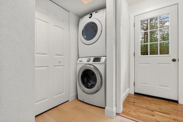 a utility room with sink dryer and washer