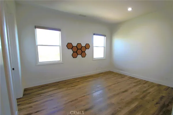 a kitchen with stainless steel appliances granite countertop a sink and a stove