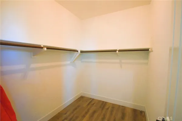 a view of empty room with windows