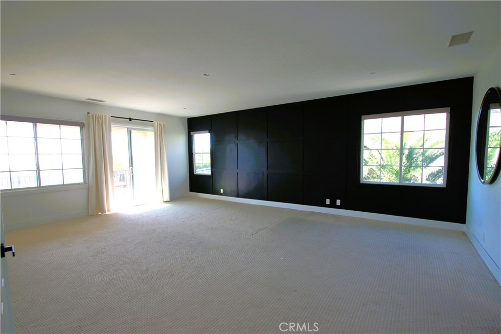 5016 Corral Court Rancho Cucamonga, CA 91737 - Photo 45 of 70 an empty room with windows
