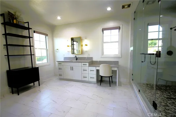 a view of a table and chairs in patio