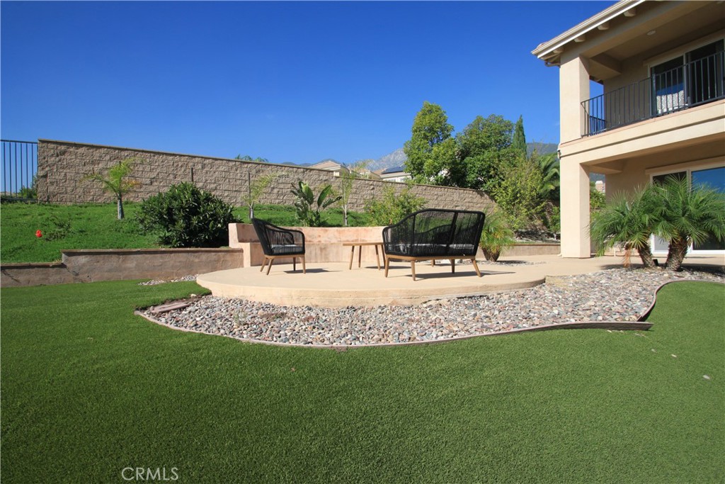 5016 Corral Court Rancho Cucamonga, CA 91737 - Photo 65 of 70 a view of a house with a yard
