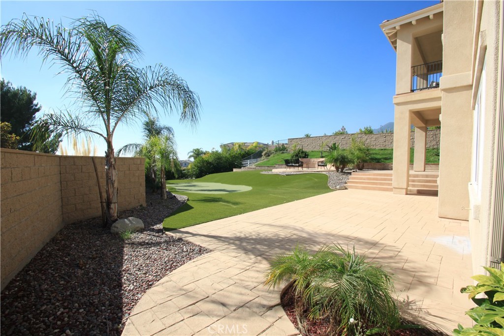 5016 Corral Court Rancho Cucamonga, CA 91737 - Photo 67 of 70 a view of a backyard with palm tree